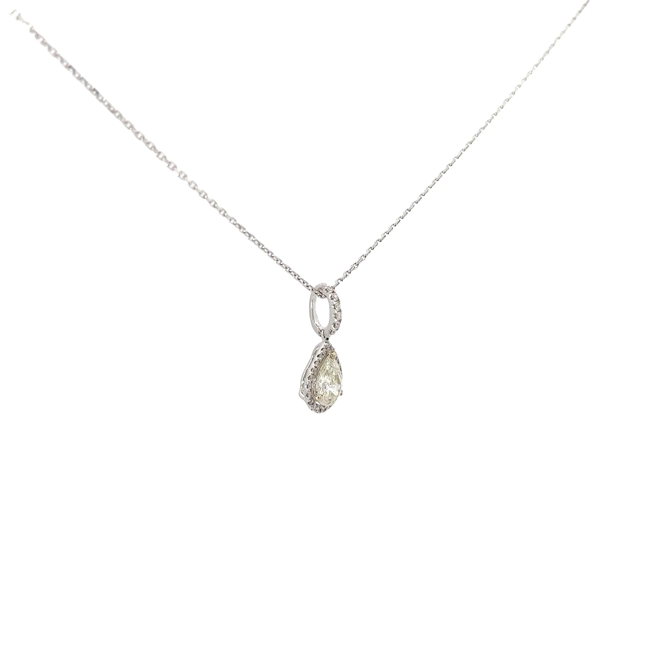 18k White Gold .88ct J SI1 Center Pear Shape Diamond and along Halo .13ct J SI1 Round Diamond Necklace Certified By EGL USA #US62512901