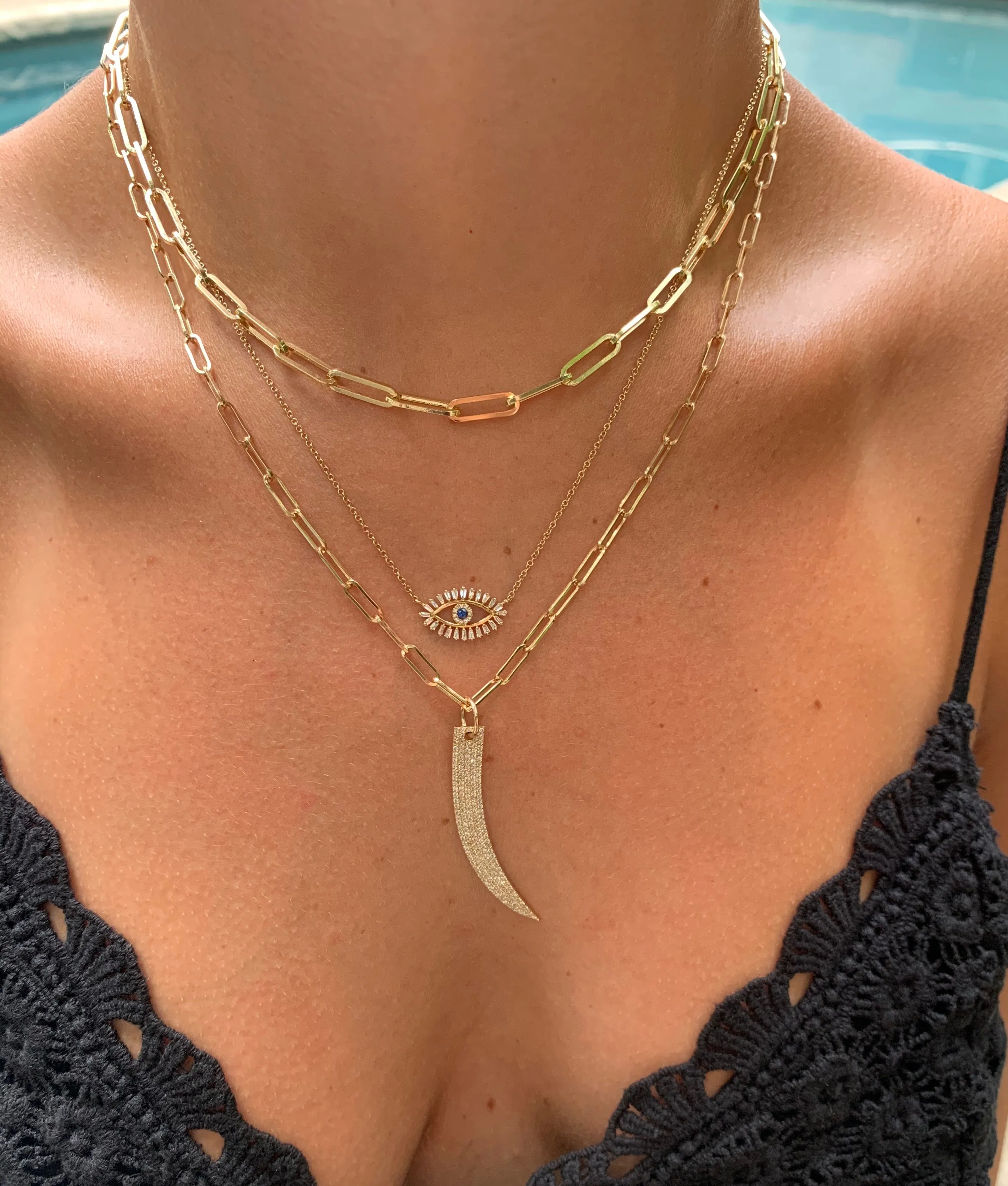 BAGUETTE DIAMOND EVIL EYE NECKLACE WITH BLUE SAPPHIRE EYE
