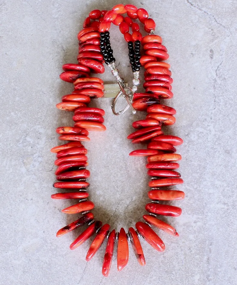 Bamboo Coral Disc Graduated Necklace with Sterling Silver Discs, Black Indonesian Glass Rondelles, Bamboo Coral Ovals, and a Sterling Silver Toggle Clasp