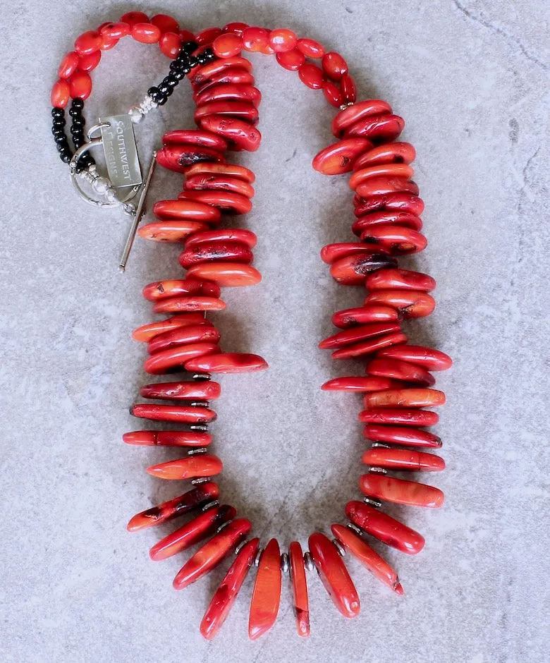 Bamboo Coral Disc Graduated Necklace with Sterling Silver Discs, Black Indonesian Glass Rondelles, Bamboo Coral Ovals, and a Sterling Silver Toggle Clasp