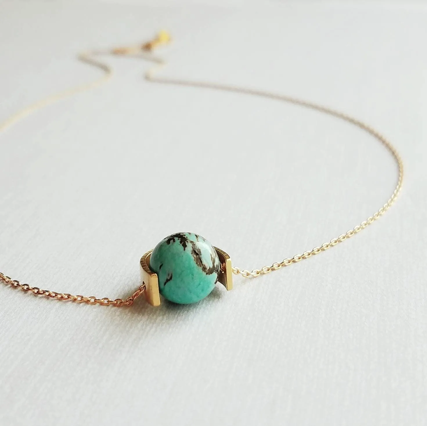 Gold Eclipse Necklace, turquoise blue stone, howlite necklace, brown black veining, round gemstone necklace, gold semicircle pendant, modern