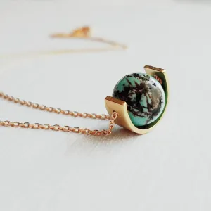 Gold Eclipse Necklace, turquoise blue stone, howlite necklace, brown black veining, round gemstone necklace, gold semicircle pendant, modern