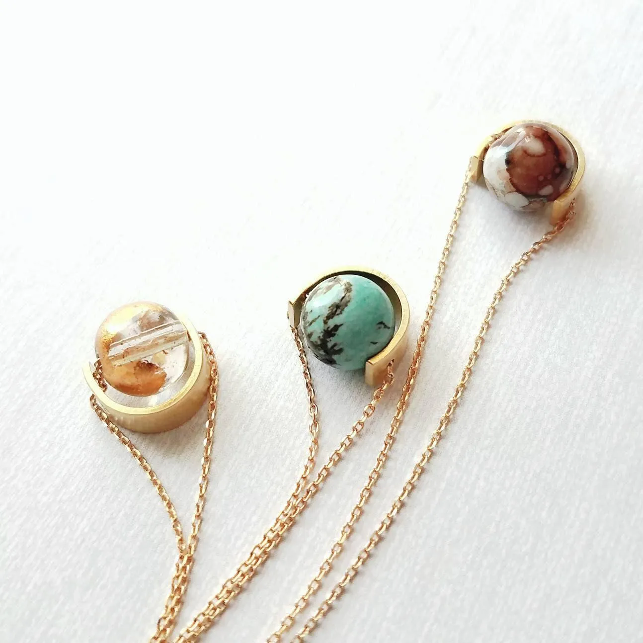 Gold Eclipse Necklace, turquoise blue stone, howlite necklace, brown black veining, round gemstone necklace, gold semicircle pendant, modern