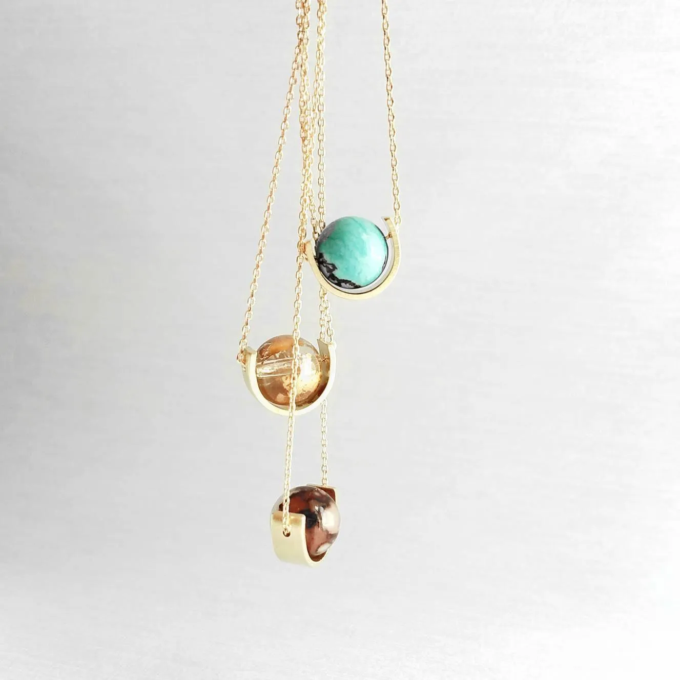 Gold Eclipse Necklace, turquoise blue stone, howlite necklace, brown black veining, round gemstone necklace, gold semicircle pendant, modern