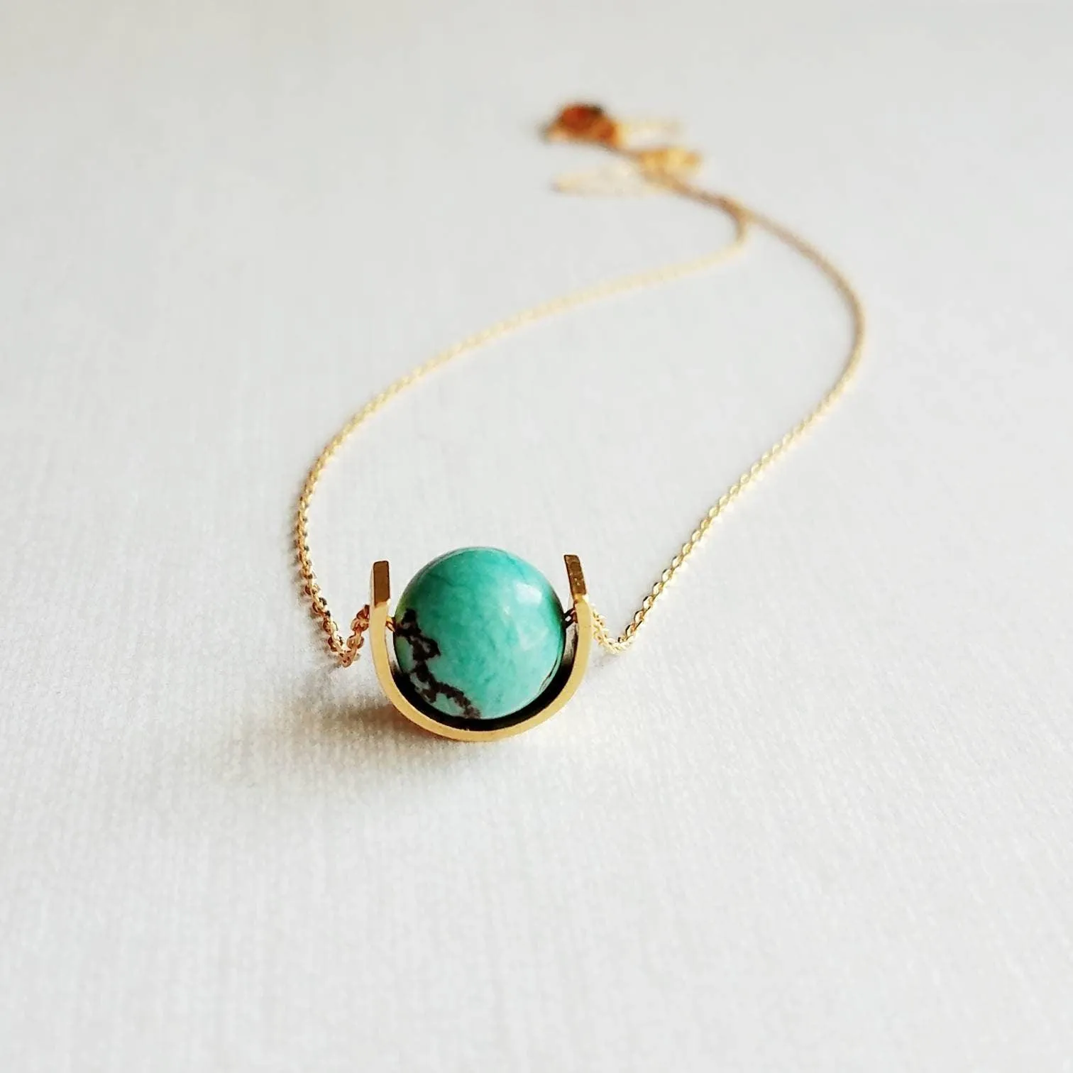 Gold Eclipse Necklace, turquoise blue stone, howlite necklace, brown black veining, round gemstone necklace, gold semicircle pendant, modern