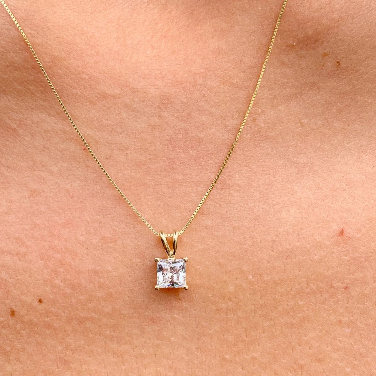 Lady's delicate 14k solid yellow gold 1.00ct princess cut forever one moissanite prong set solitaire necklace and chain