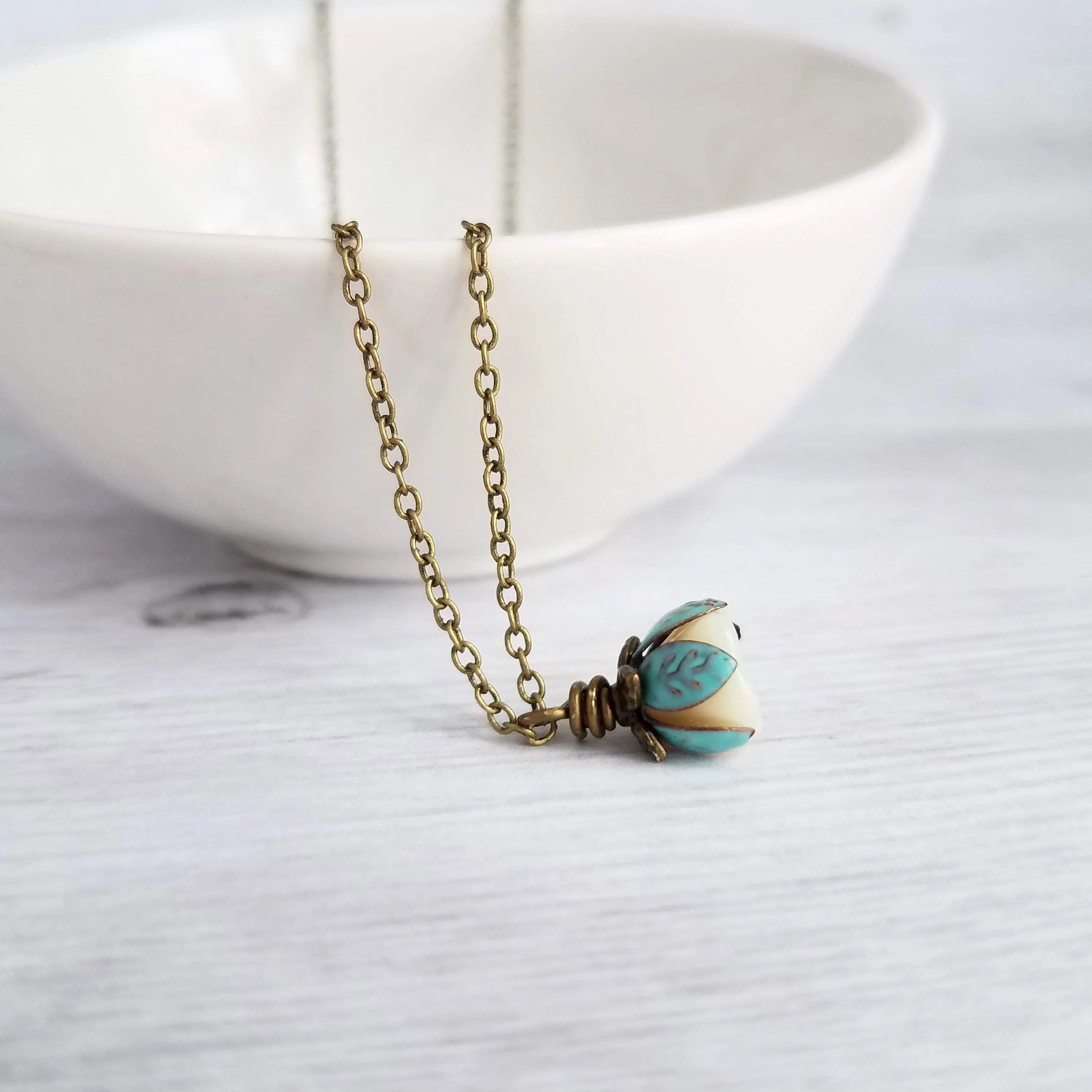 Little Flower Necklace - delicate boho blossom pendant in vanilla cream - mint aqua patina leaves - thin fine antique brass/bronze chain
