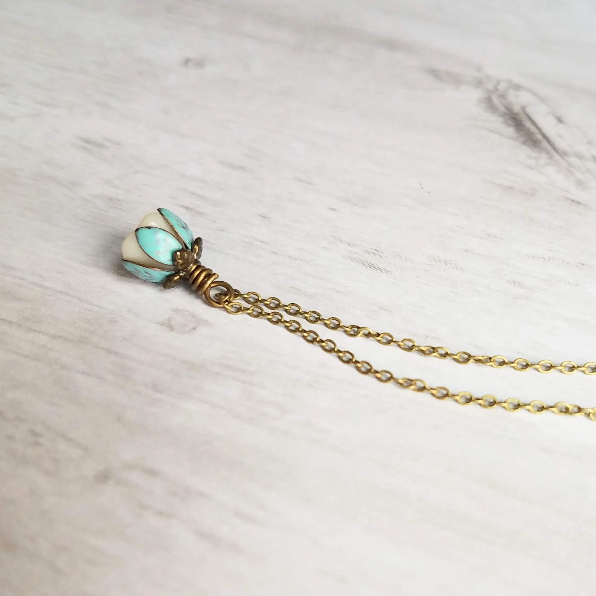 Little Flower Necklace - delicate boho blossom pendant in vanilla cream - mint aqua patina leaves - thin fine antique brass/bronze chain