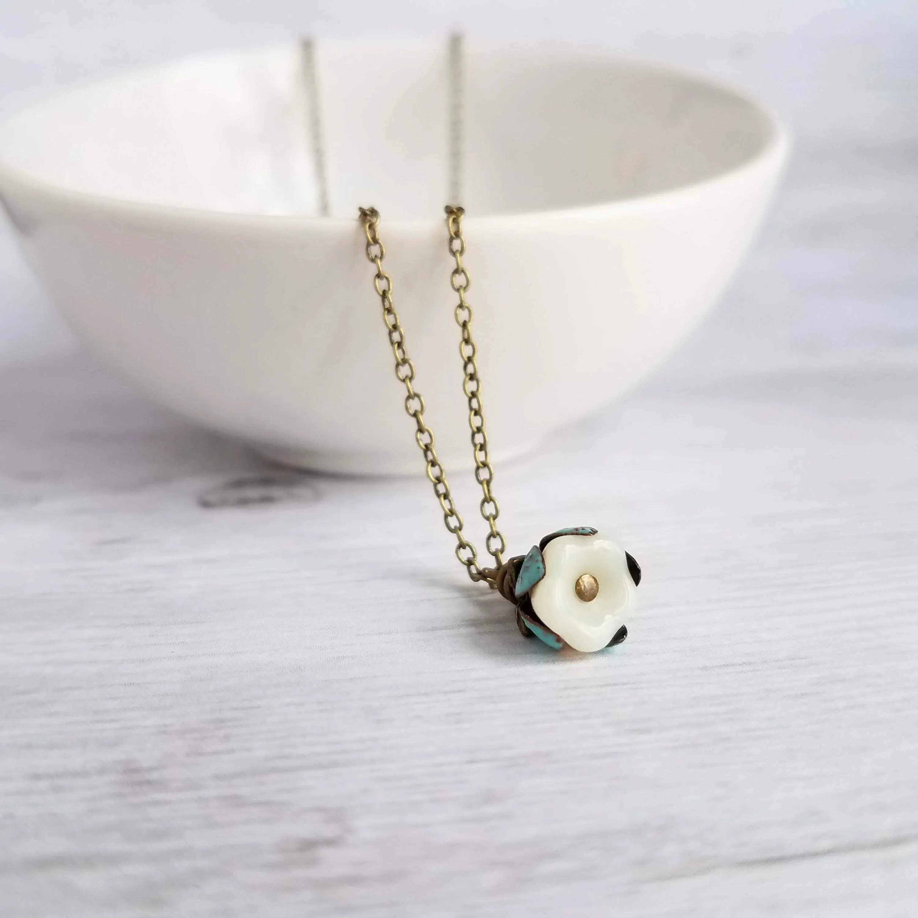 Little Flower Necklace - delicate boho blossom pendant in vanilla cream - mint aqua patina leaves - thin fine antique brass/bronze chain