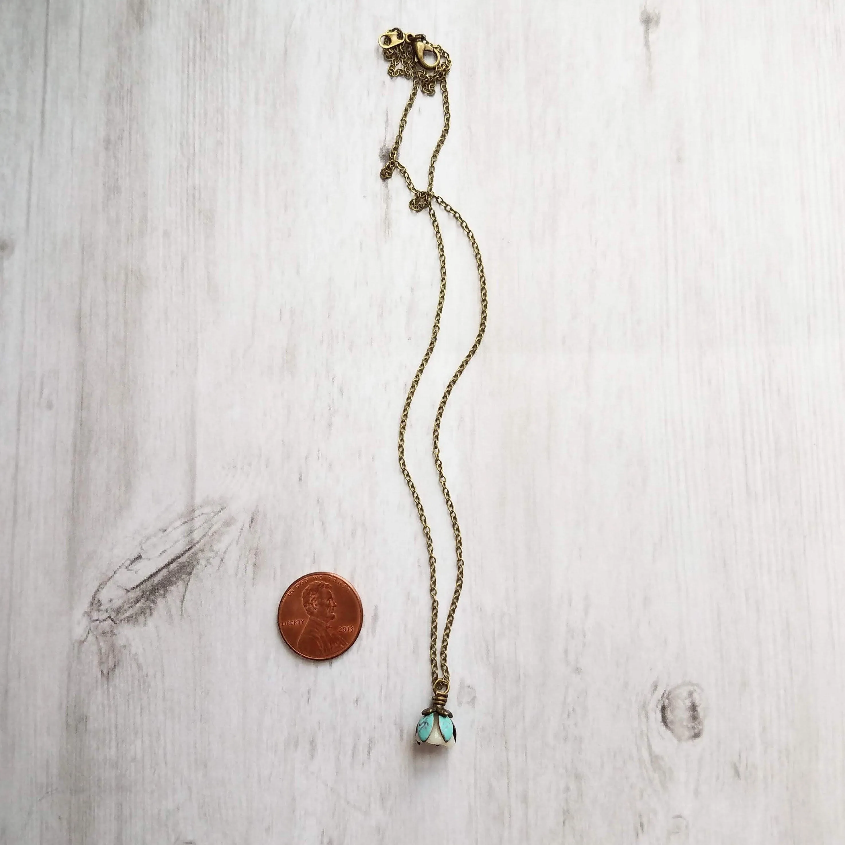 Little Flower Necklace - delicate boho blossom pendant in vanilla cream - mint aqua patina leaves - thin fine antique brass/bronze chain