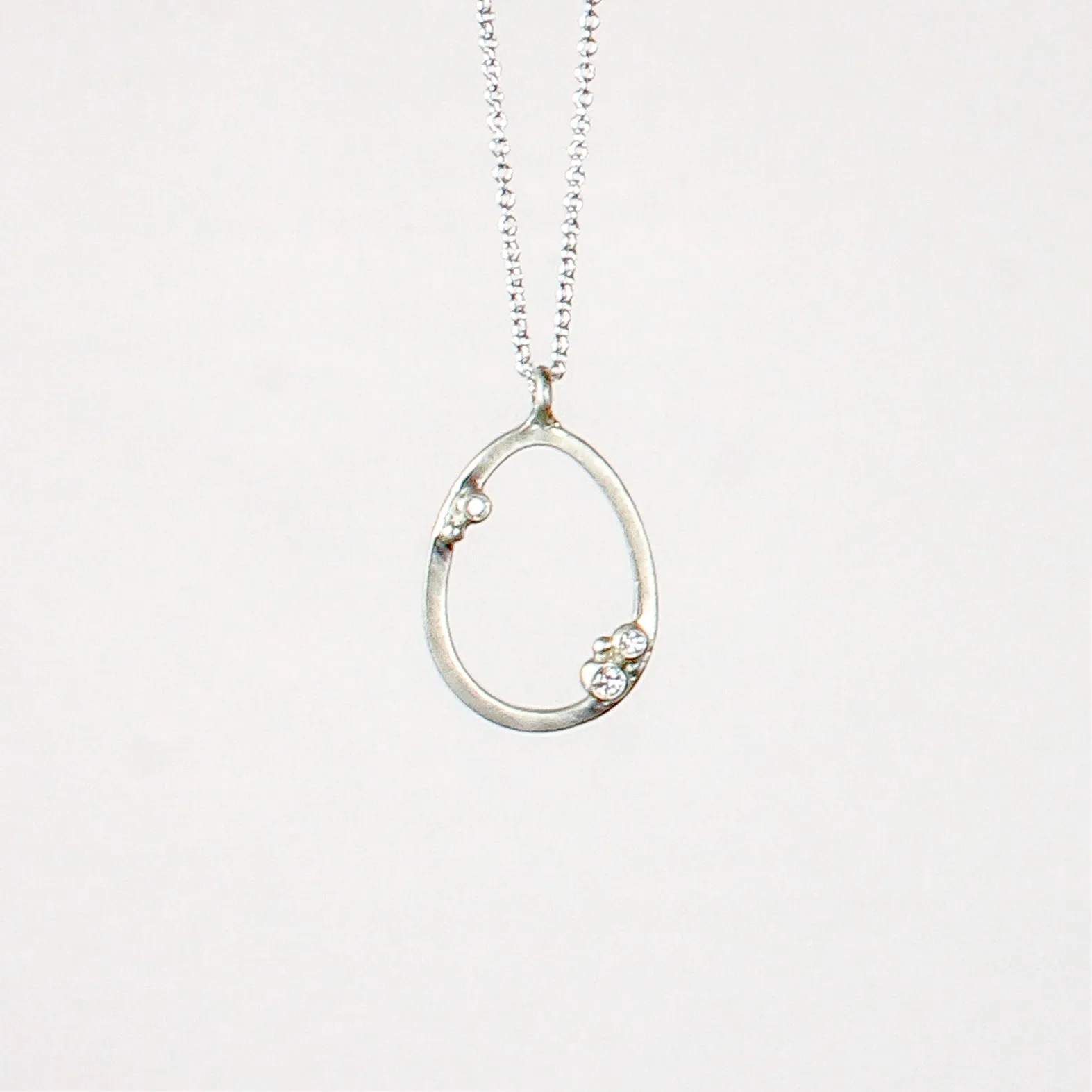 NEW! Encrusted Outlined Egg Necklace in by Branch