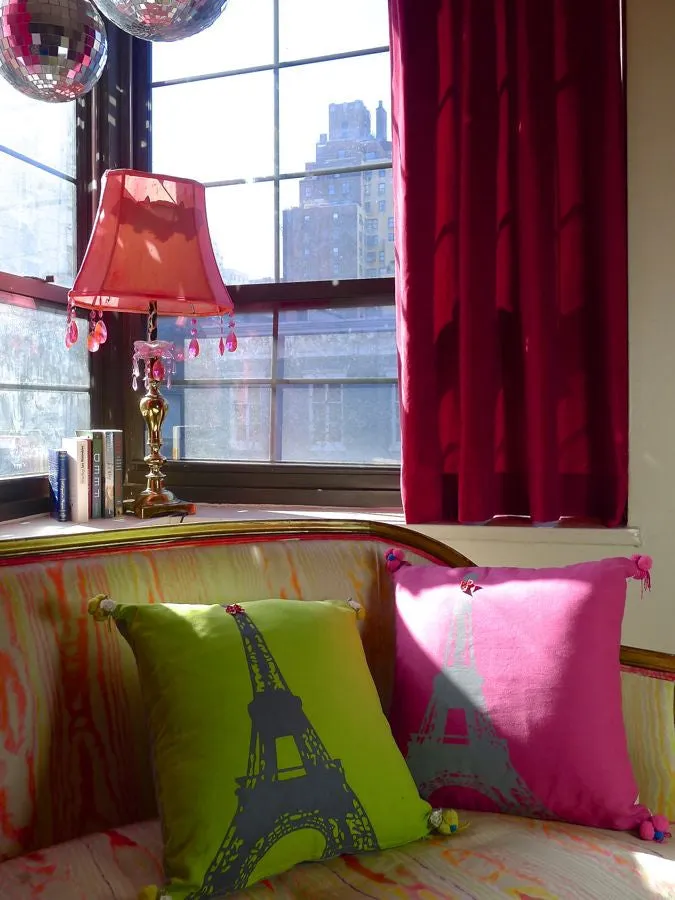 Pink or green Eiffel Tower print cushion