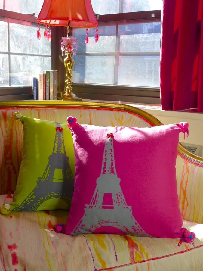 Pink or green Eiffel Tower print cushion