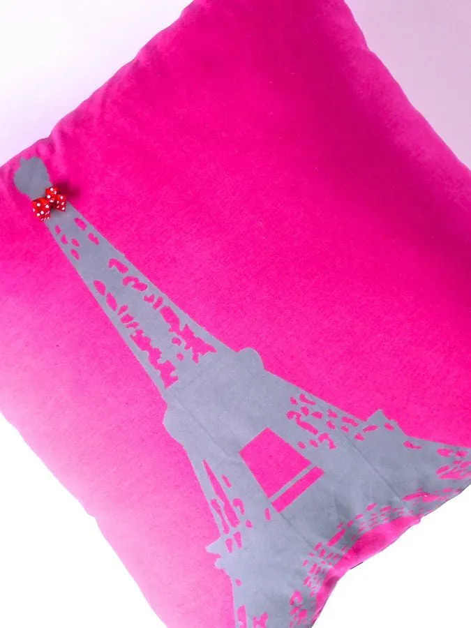 Pink or green Eiffel Tower print cushion