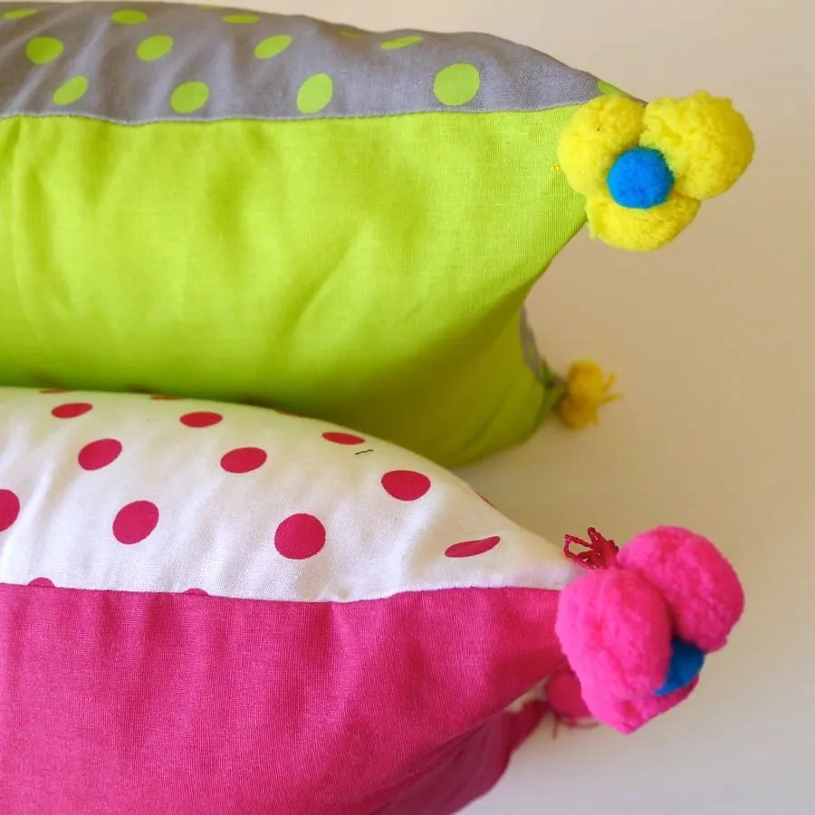 Pink or green Eiffel Tower print cushion